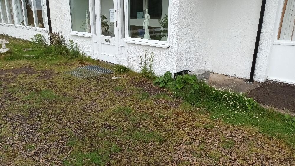 External view of the property looking unkempt