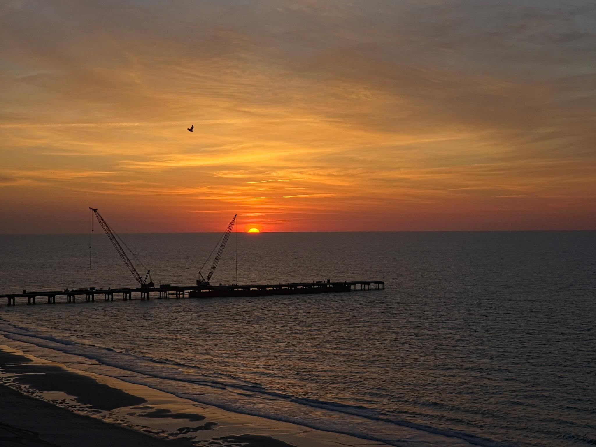 Sunrise from the Balcony Working Pier is actually called the "outfall project". You can google for more info