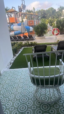 Walk out to the waterpark with private lounge chairs