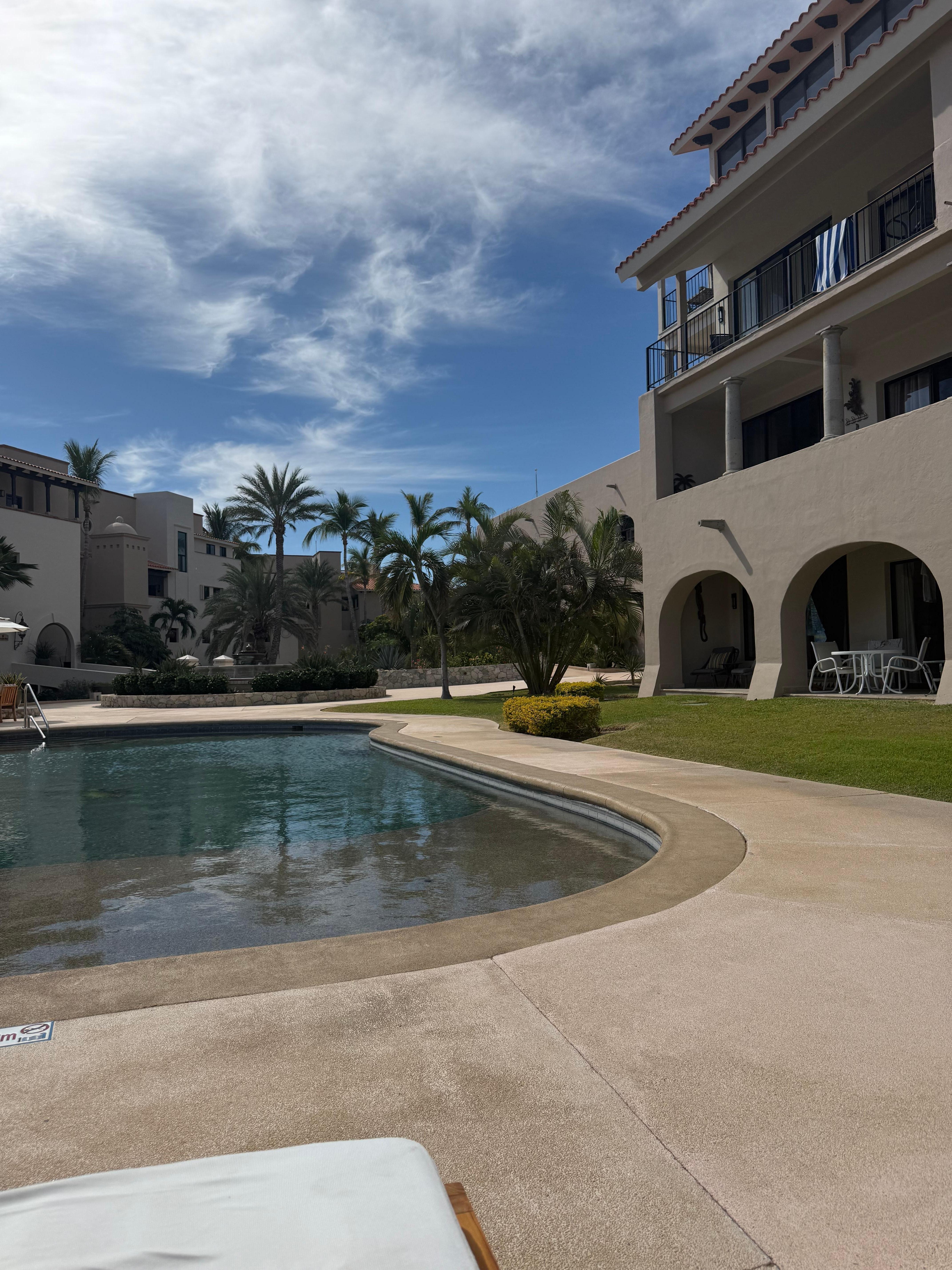 Condo is to the left of the pool - very convenient! 