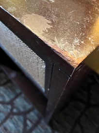 Stained and scratched furniture everywhere you look.