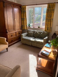 Sitting room outside our room with local information (more in the room)