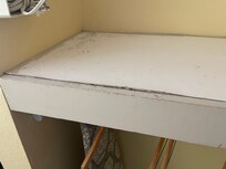 Dirty closet shelf