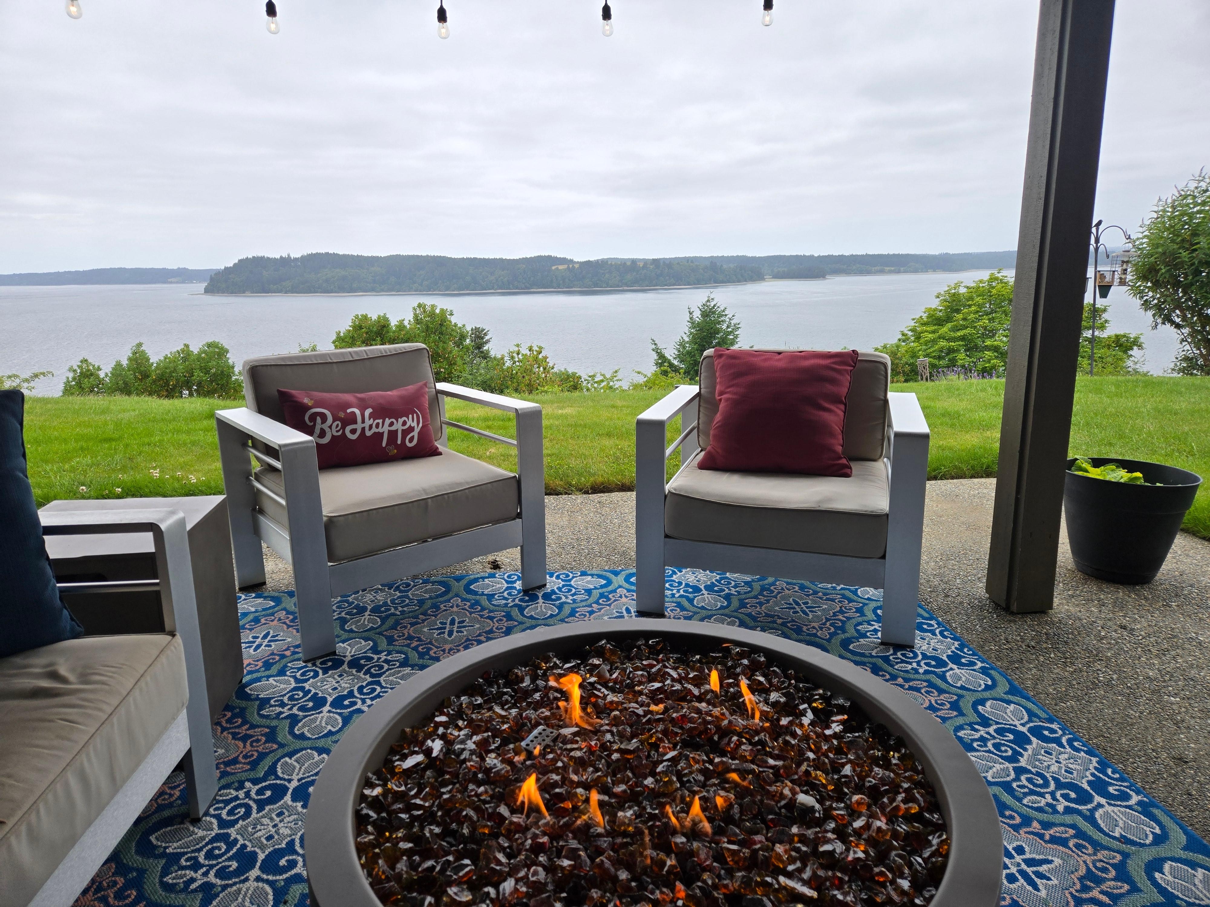 Outdoor seating area with firepit and that amazing view!