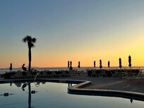 Sun rising over the pool area