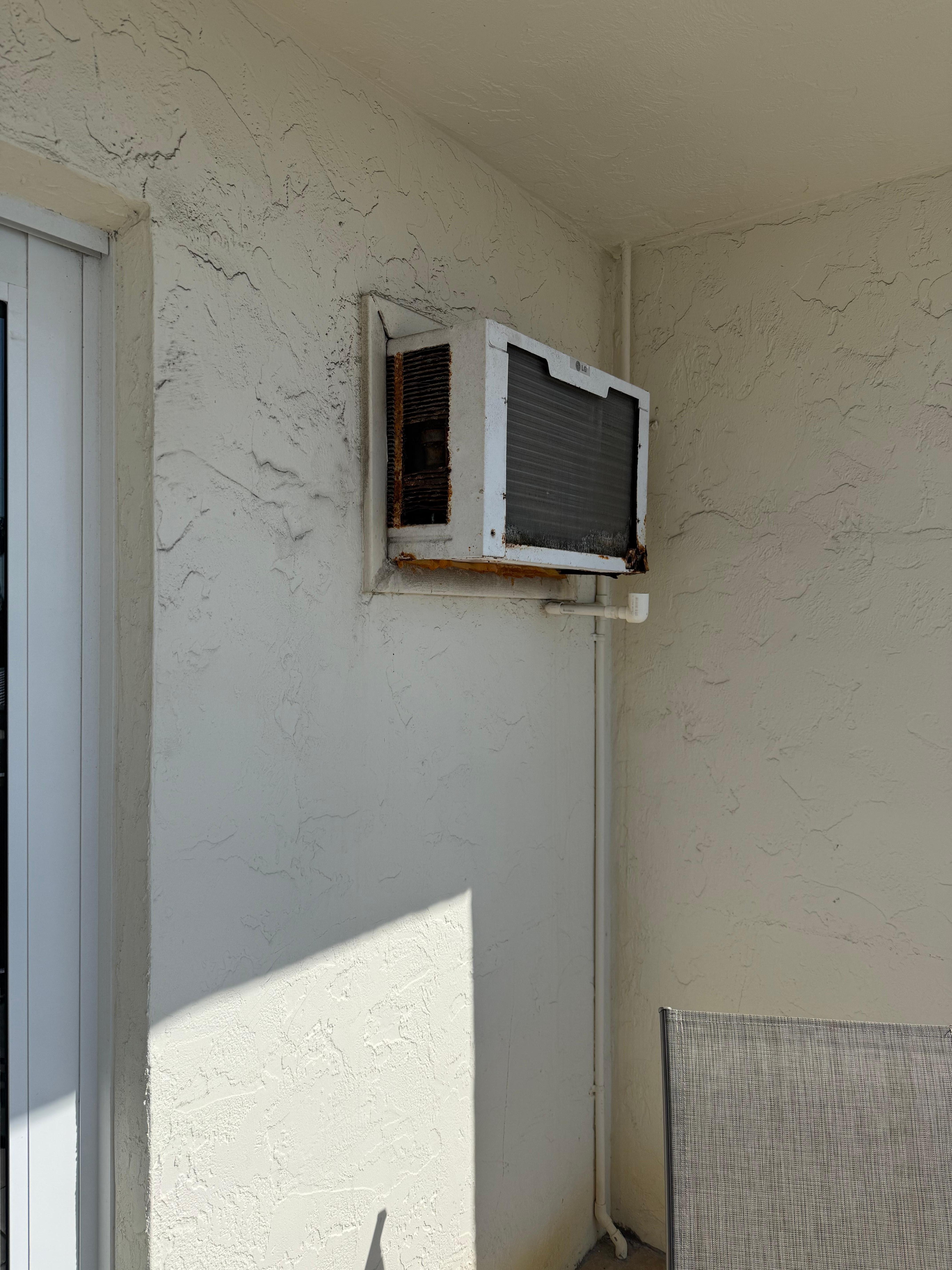 Notice rust and just old air conditioner 