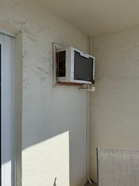 Notice rust and just old air conditioner