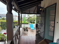 Front door to Casita with view of the terrace and La Jolla business district.