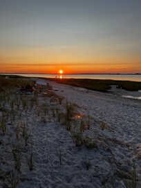 Sunset at Sandy Neck across from Cape Cod village.