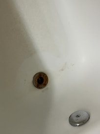 Tub was dirty with a rusty drain