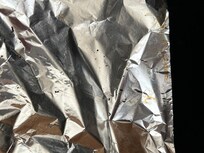 Dirty tin foil lining the oven