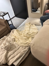 Thin matress on floor I had to sleep on