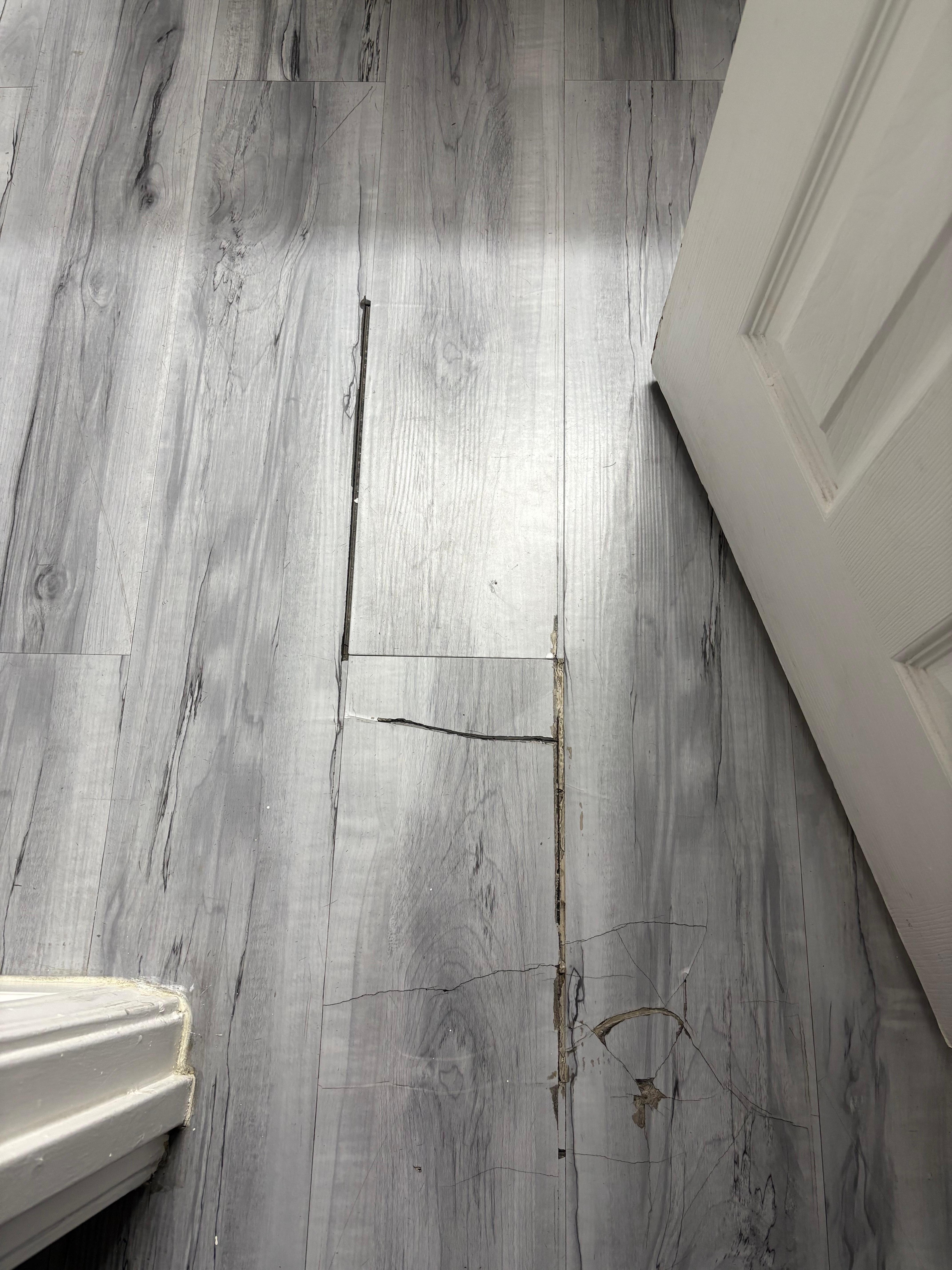 Broken floor tiles not shown in the booking photos 