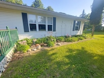 Flowers in front attracted hummingbirds.