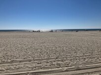 The beach vista with a wonderful boardwalk at Long. Beach, Long Island