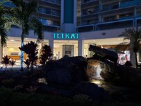 Back entrance to Illikai resort with beautiful outdoor seating