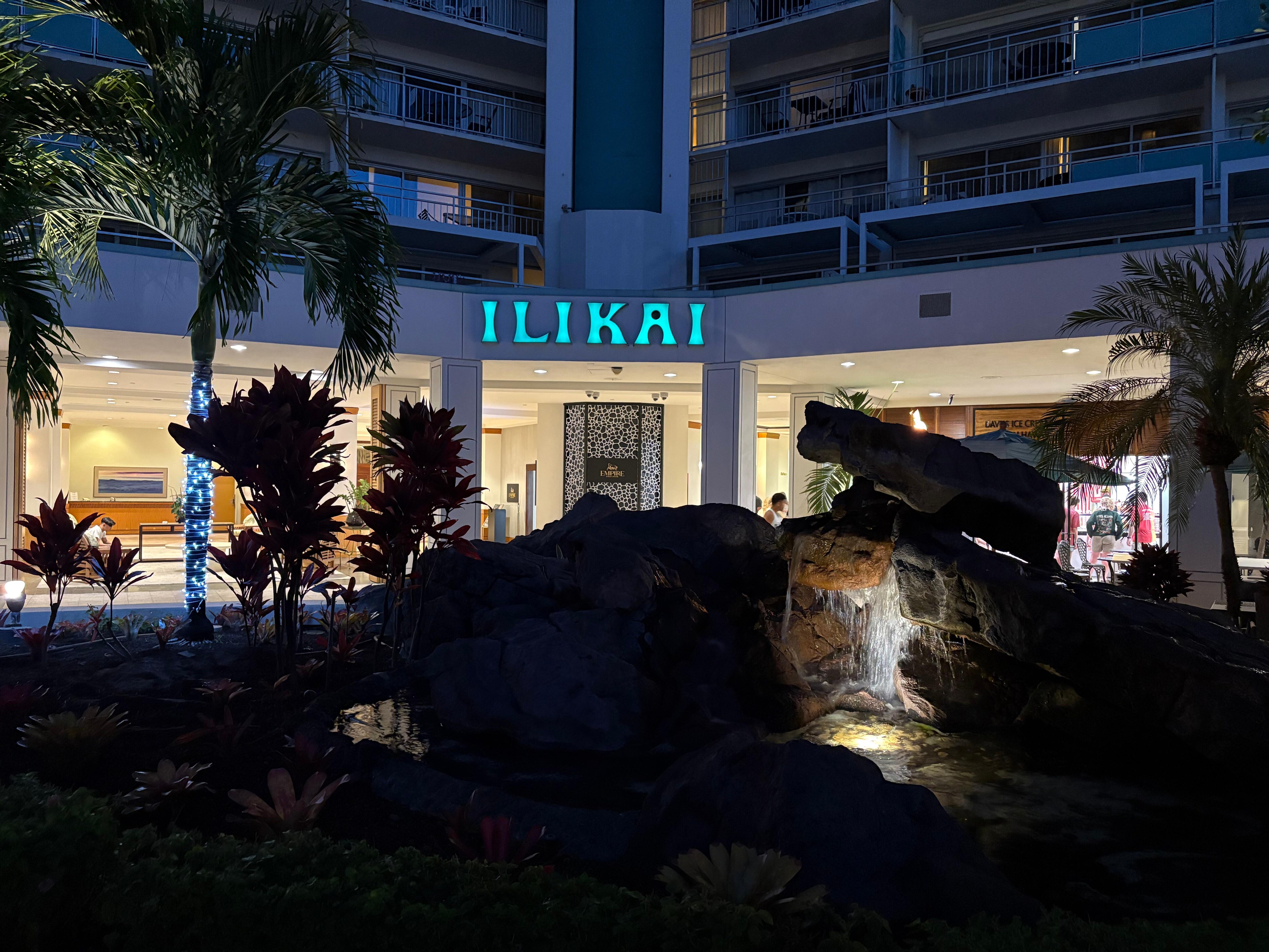 Back entrance to Illikai resort with beautiful outdoor seating