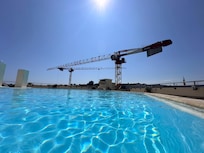 Rooftop pool & crane