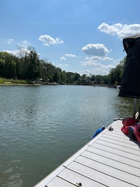 Such a serene view, sitting on the dock watching the river go by.