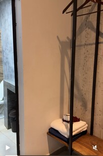Small area to hang clothes and put belongings