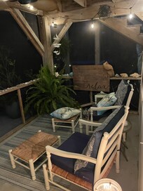 Cozy screened porch for morning and evening.