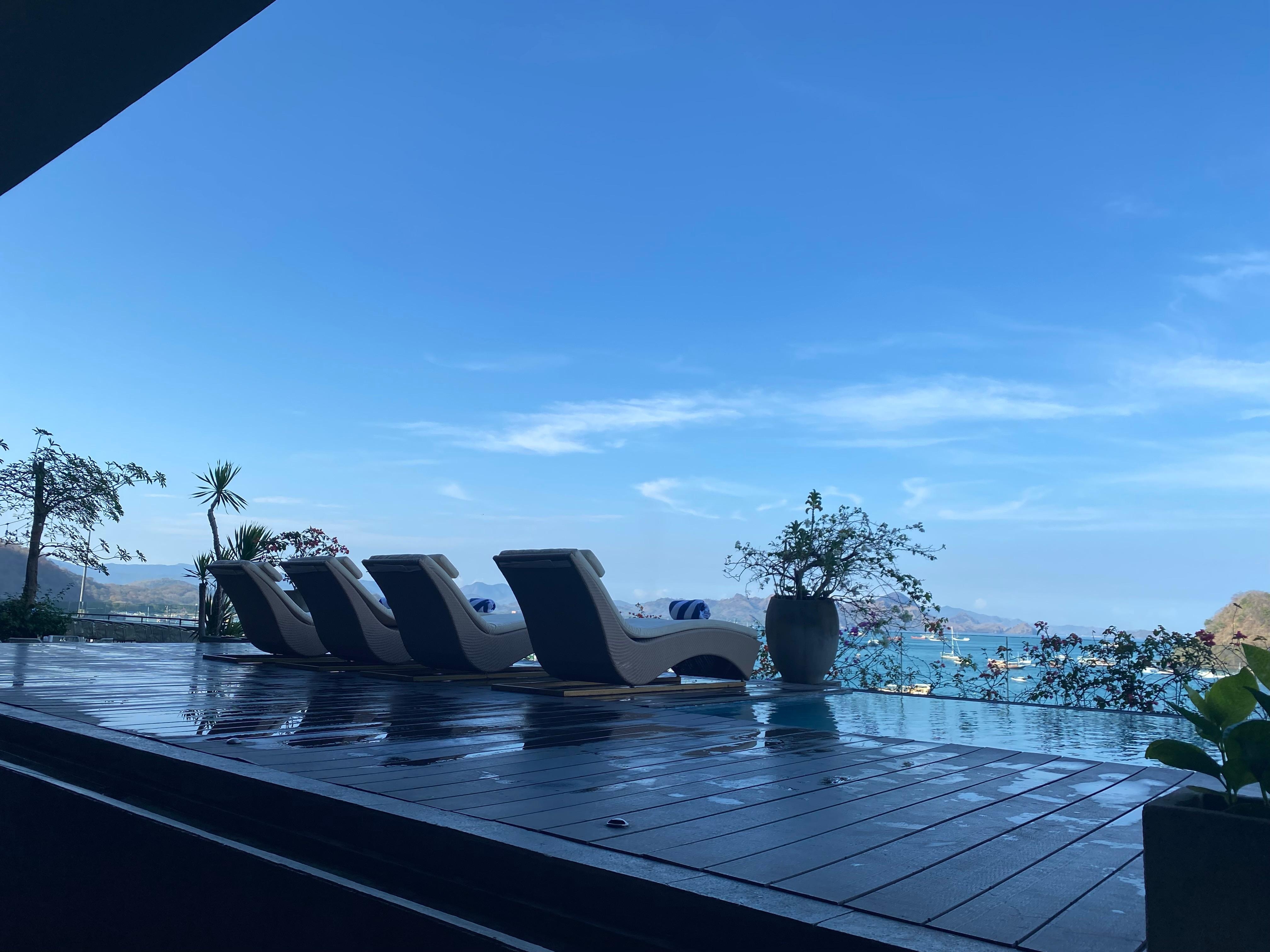 The total number of pool chairs. Notice no shade.