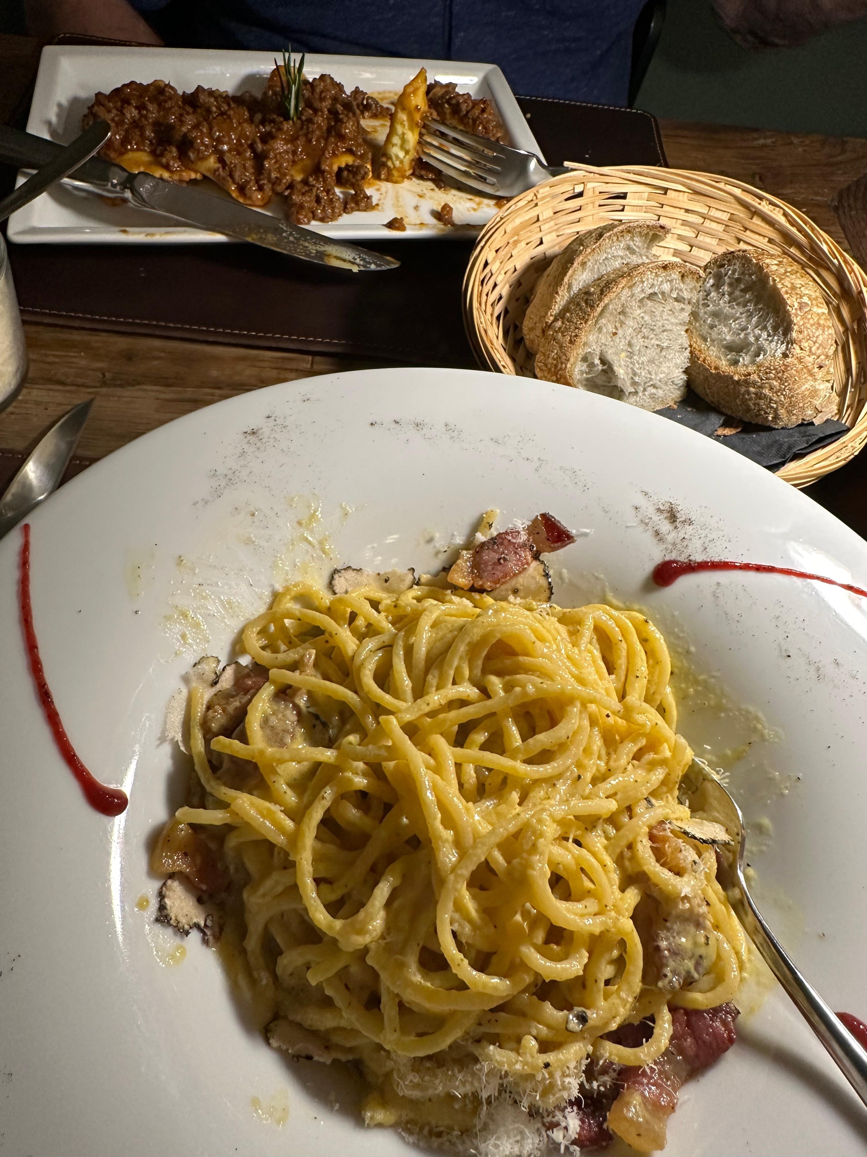 Spaghetti Carbonara with white Truffle Sauce and butter.  The best pasta dish I ever had. Osteria Caffe Italiano
