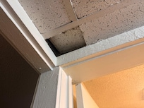 That’s a hole in the ceiling leading to the bathroom