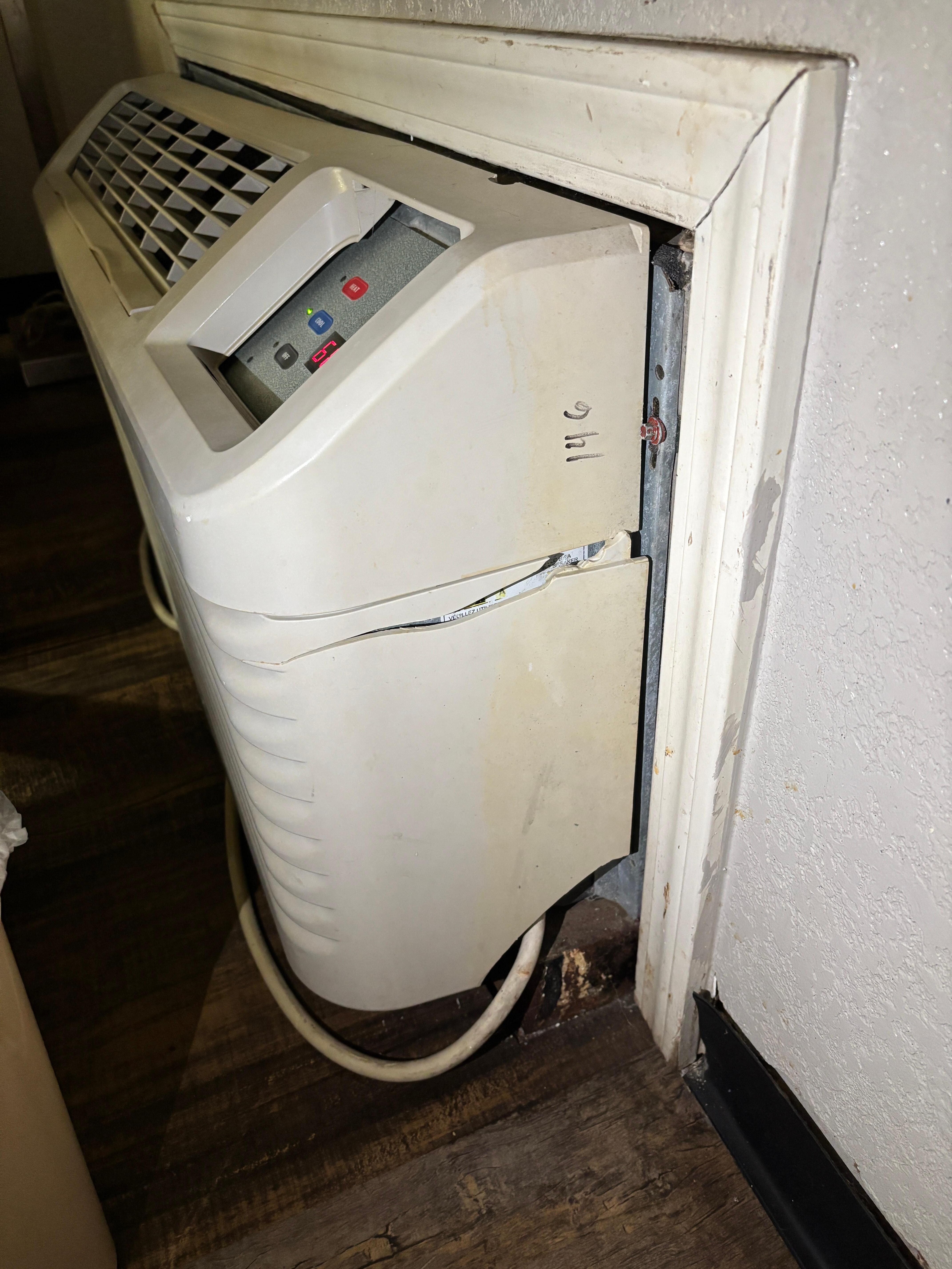 Rusted and cracked a/c that falls off when touched