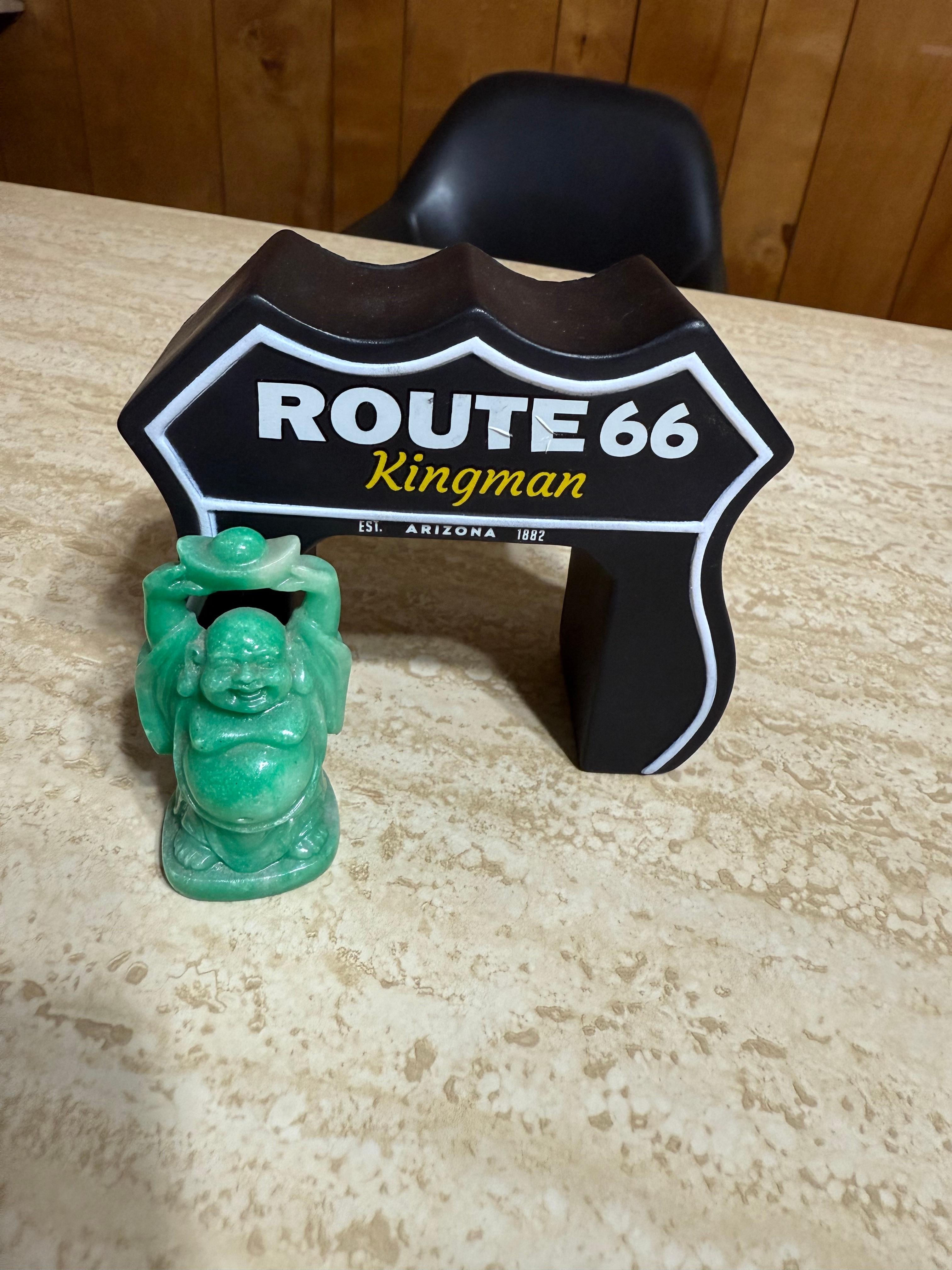 Front desk, Buddha and Route 66 visitor centersign replica