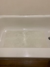 Tub looked dirty and grout needed replacing.