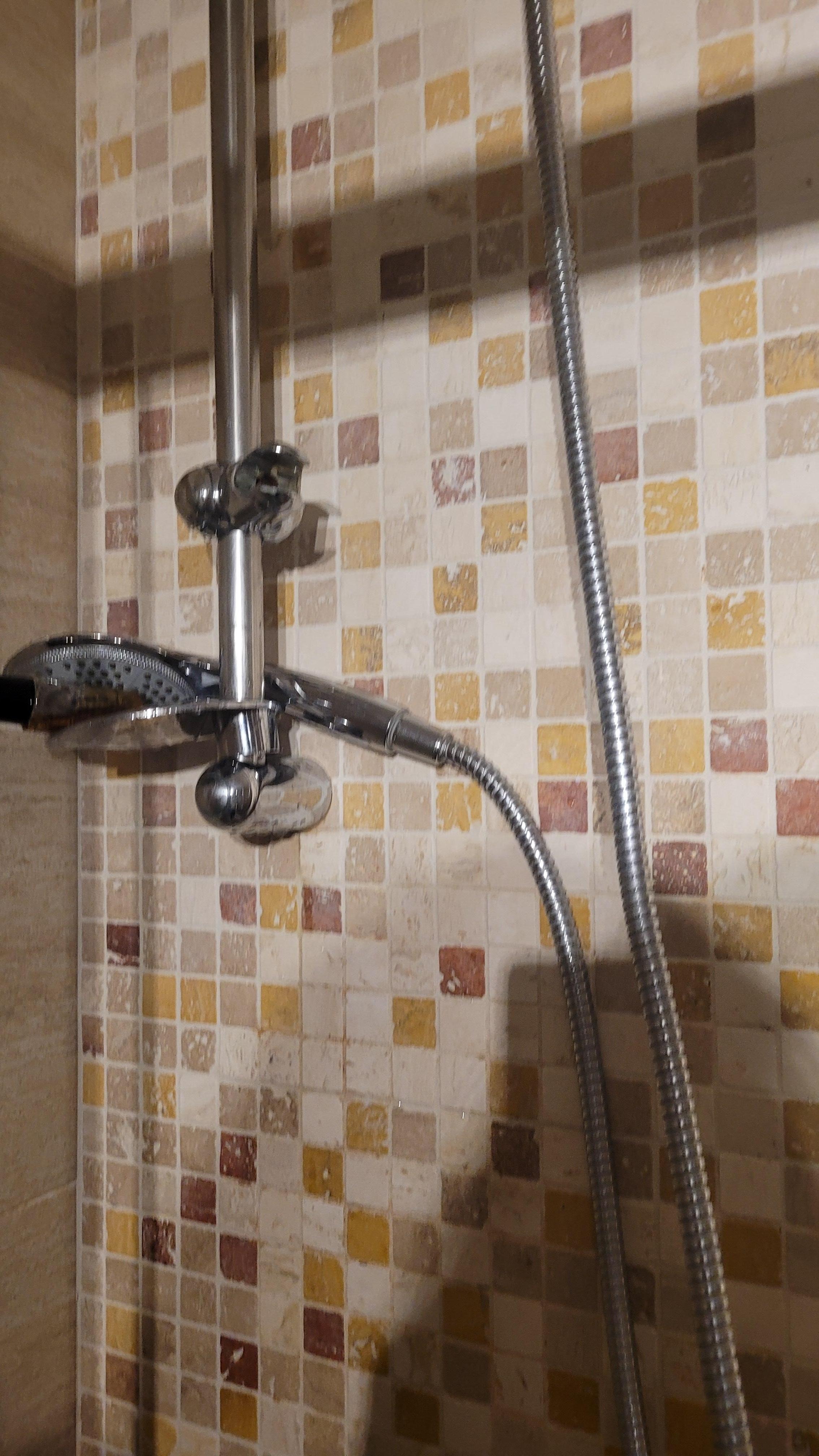 Shower head would not tighten and stay up.