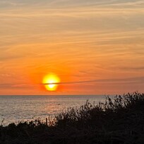 Sunset across the street at Charley Young Beach