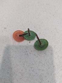 Roofing nails found in Roofing nails indriveway and parking area. We found over 25 of them after a flat tire.