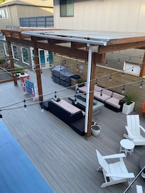 Entertainment area. Games, fire pits, BBQ, Dog area and just a place to chill.