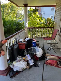 My belongings at porch . 2 computers left
In floor + my purse