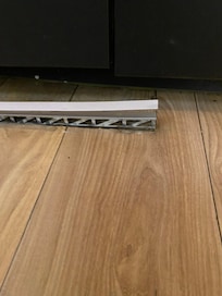 Metal strip poorly maintained and a hazard