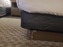 Broken bed frame on both beds