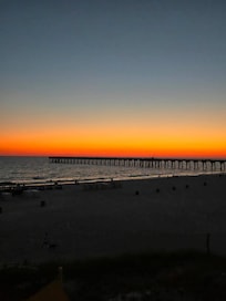 Sunset view from the balcony over the pier