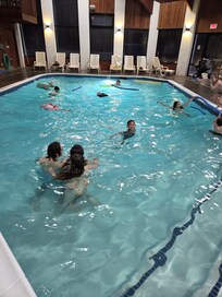 Indoor pool area & playing board games with our friends in our room