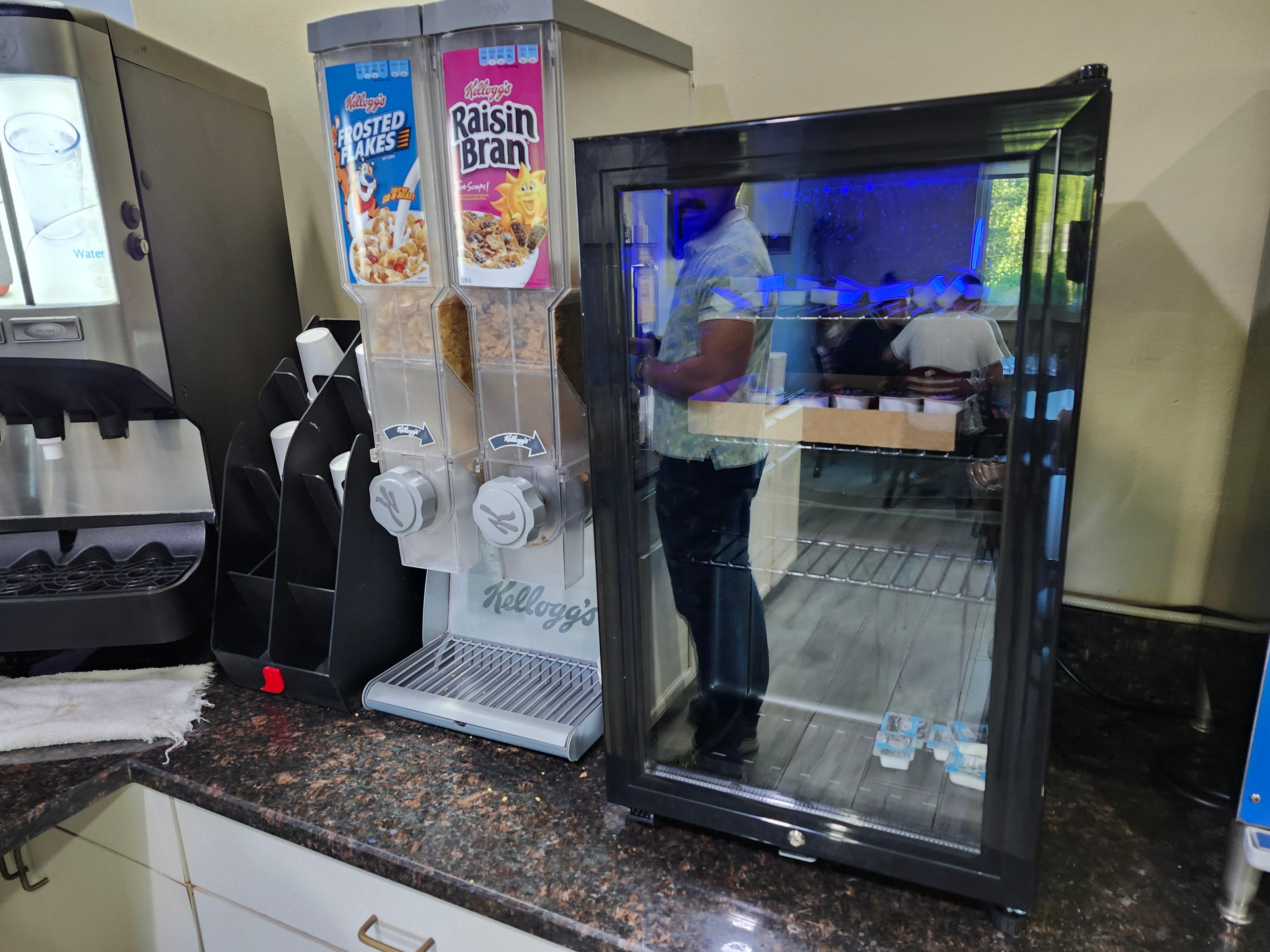 Nothing in mini-fridge except butter and cream cheese for toast/bagels.