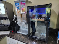 Nothing in mini-fridge except butter and cream cheese for toast/bagels.