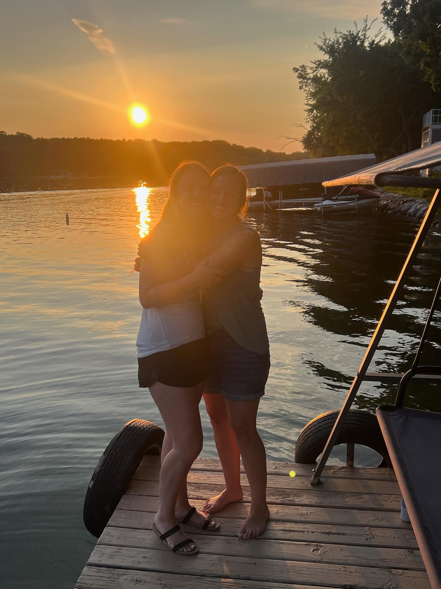 Sunset over the trees. Sister bonding. 