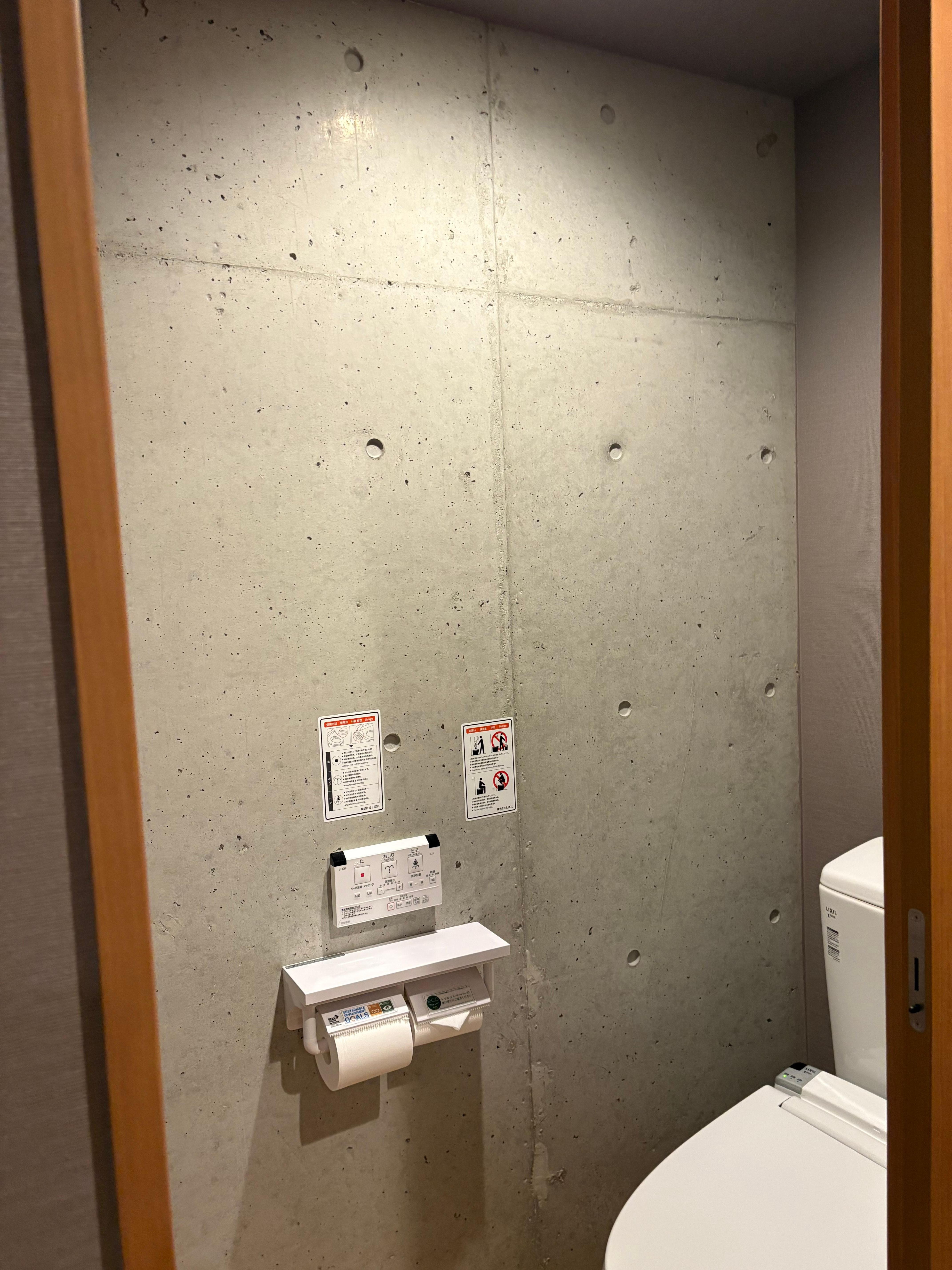 It is own rest room with door. So clean and private!