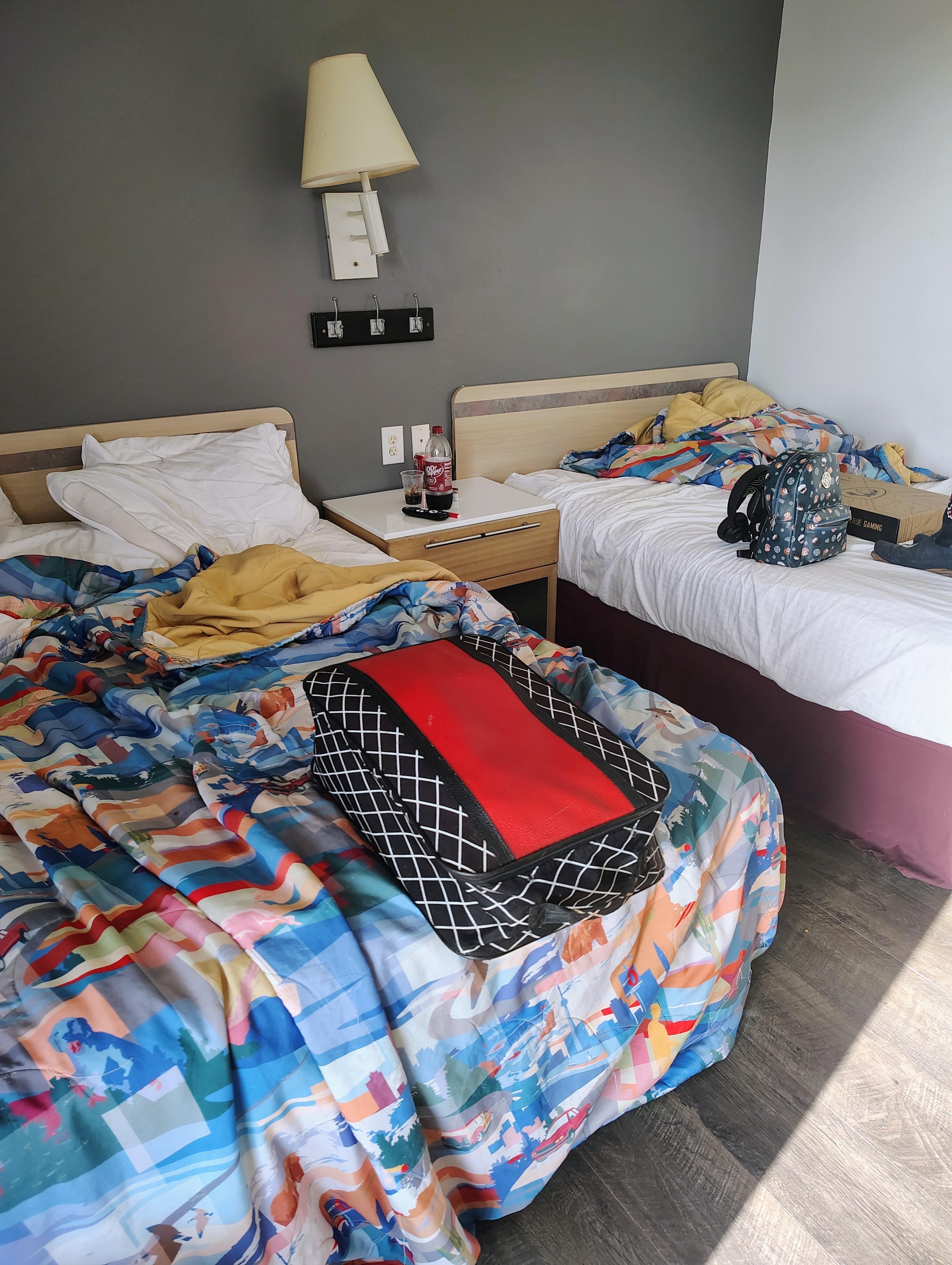 Bed on the left was all the way up against the ac unit.
