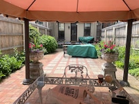 Getting the lawn furniture prepped for rain