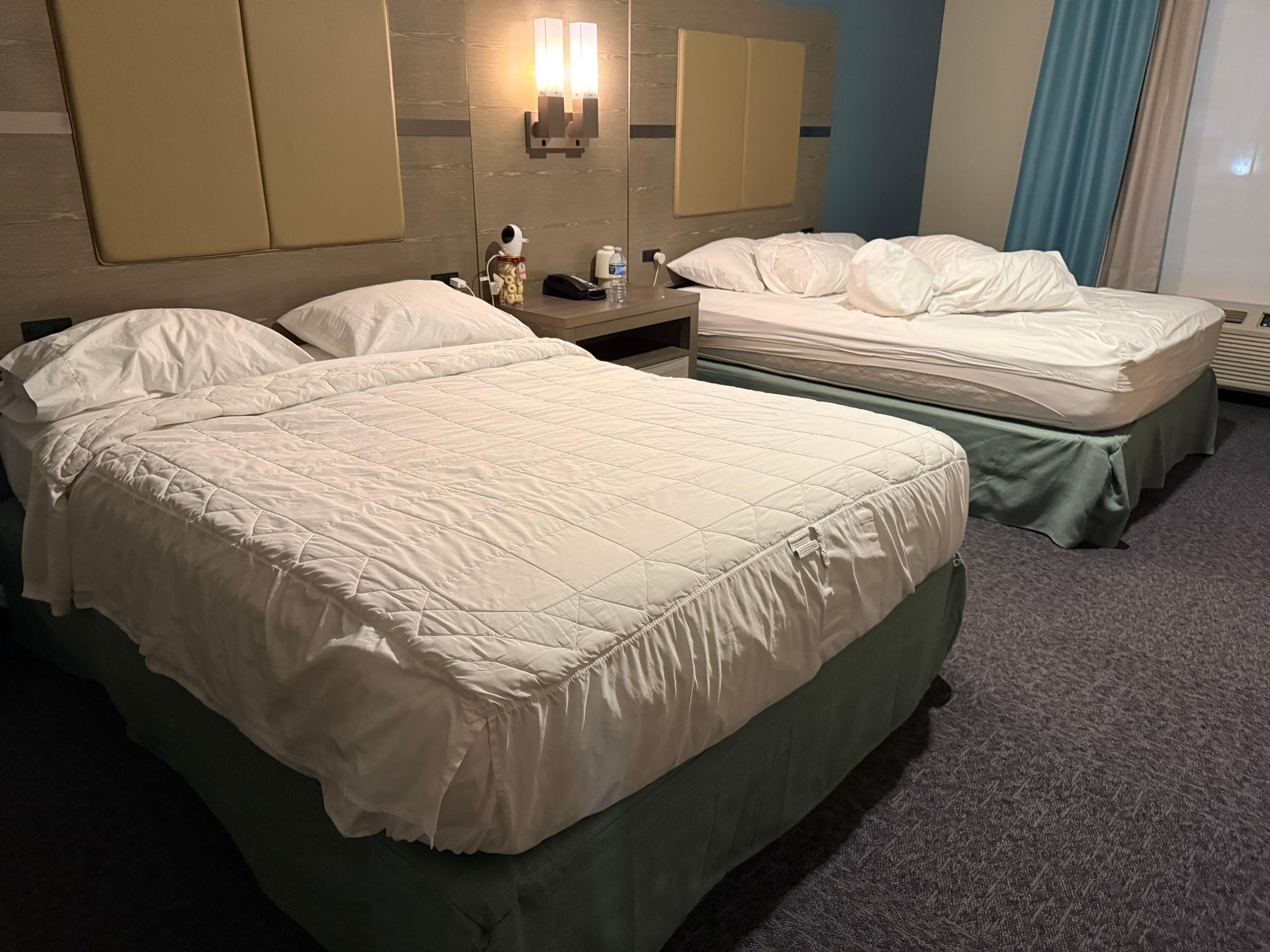 Housekeeping made one bed, left the other undone but took its sheet and duvet.