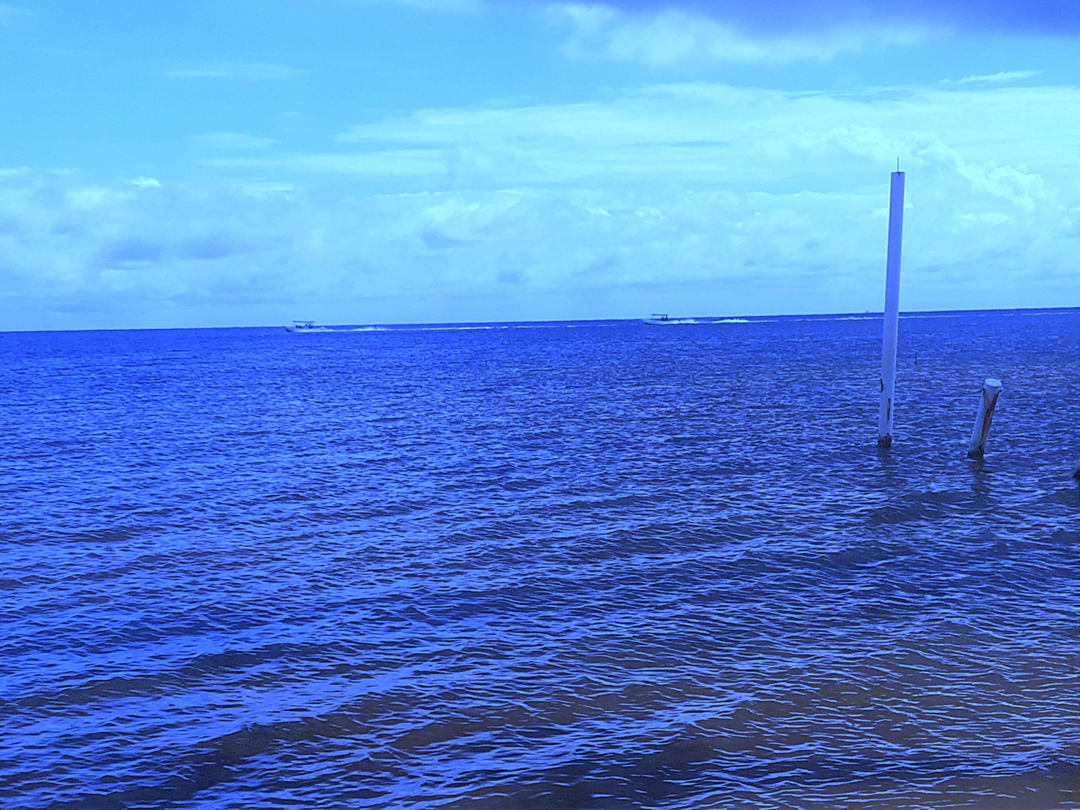 water and sky in front of the beach house