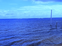 water and sky in front of the beach house