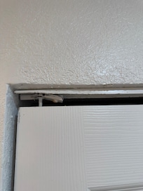 bathroom door, not properly mounted